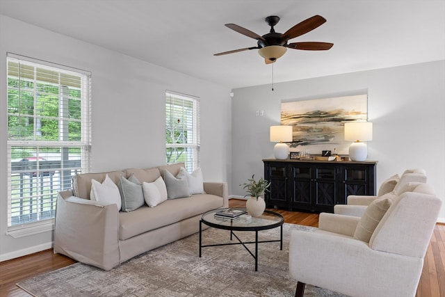 5742 Keith Rd, Ringgold, GA 30736 - living room featuring baseboards, a ceiling fan, and wood finished floors