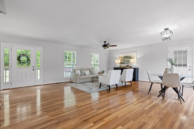 5742 Keith Rd, Ringgold, GA 30736 - living room with baseboards, ceiling fan, and light wood-style floors