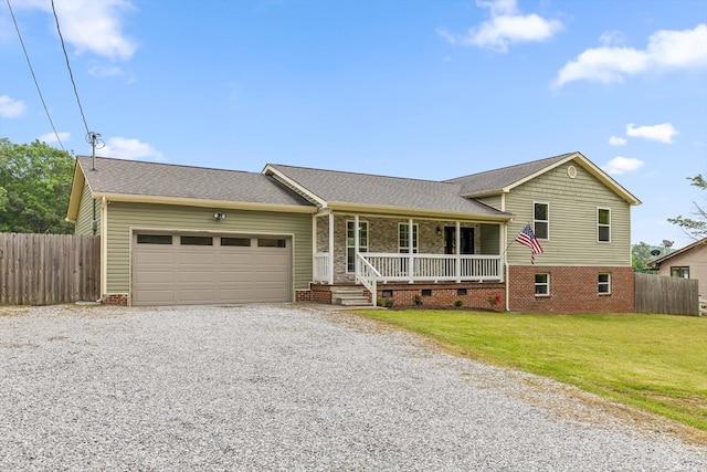 5742 Keith Rd, Ringgold, GA 30736 - view of front of property featuring a porch, driveway, a front yard, fence, and an attached garage