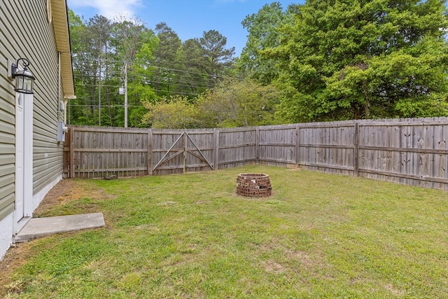 5742 Keith Rd, Ringgold, GA 30736 - view of yard featuring a fire pit and a fenced backyard