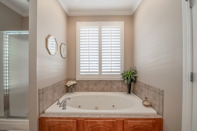 bathroom featuring a whirlpool tub, ornamental molding, and a stall shower