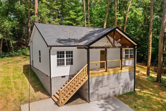 409 Van Buren Dr, Dalton, GA 30721 - view of front of property featuring crawl space, a shingled roof, covered porch, stairs, and a front yard