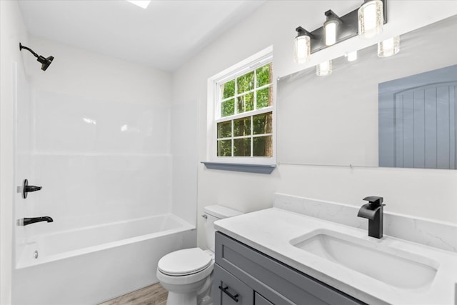 409 Van Buren Dr, Dalton, GA 30721 - full bathroom with vanity, wood finished floors, and shower / tub combination