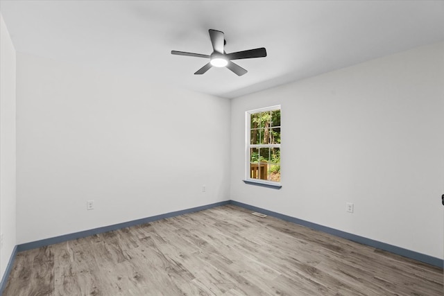 409 Van Buren Dr, Dalton, GA 30721 - spare room with wood finished floors and ceiling fan