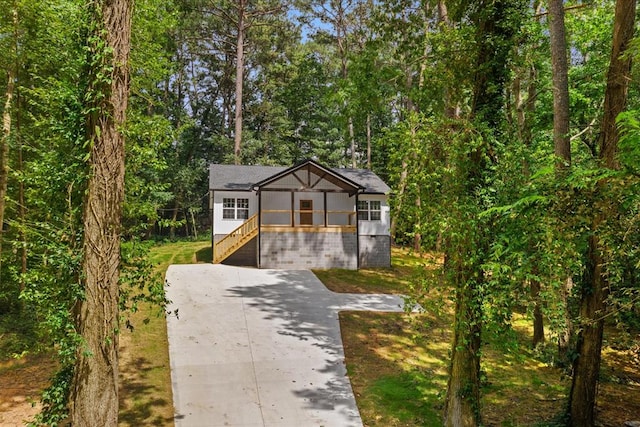 409 Van Buren Dr, Dalton, GA 30721 - view of front of property featuring stairway and a forest view