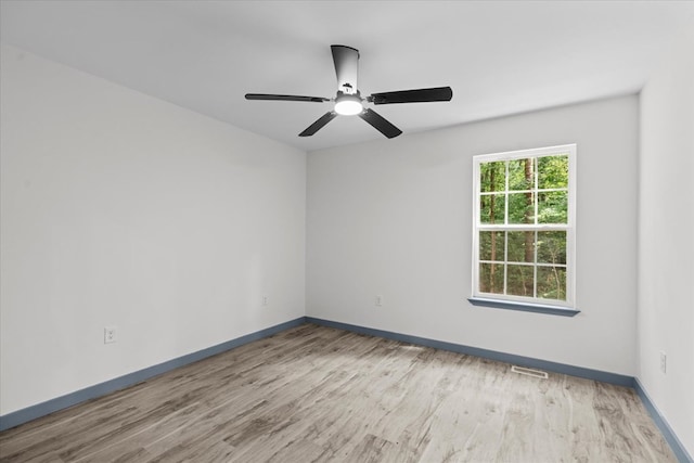 409 Van Buren Dr, Dalton, GA 30721 - unfurnished room with wood finished floors and a ceiling fan