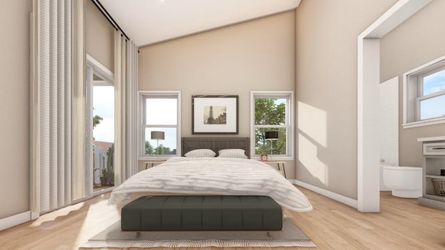 bedroom featuring multiple windows and light wood-type flooring