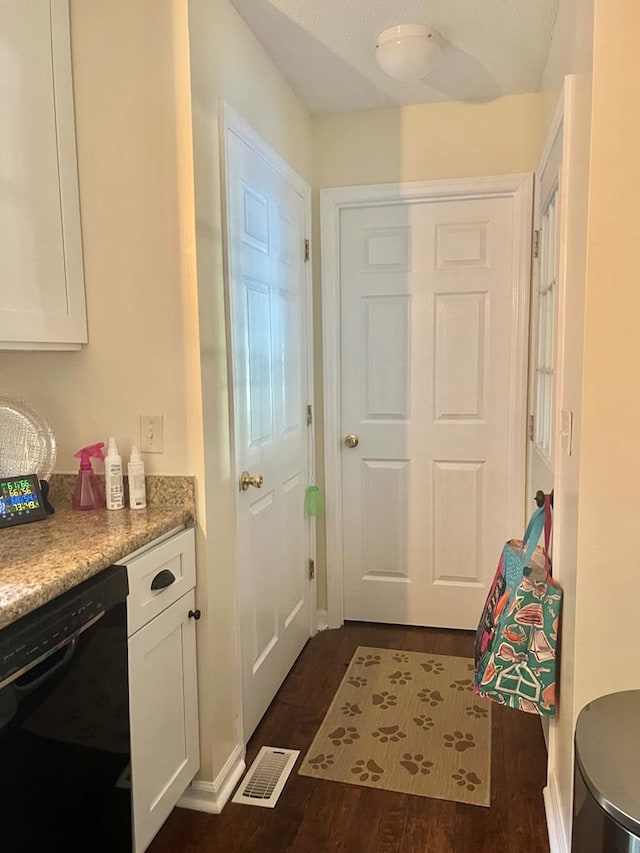 doorway to outside with dark hardwood / wood-style floors