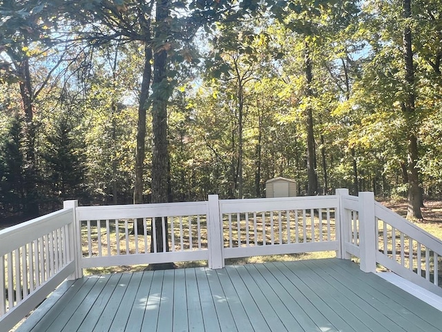 deck featuring a storage shed