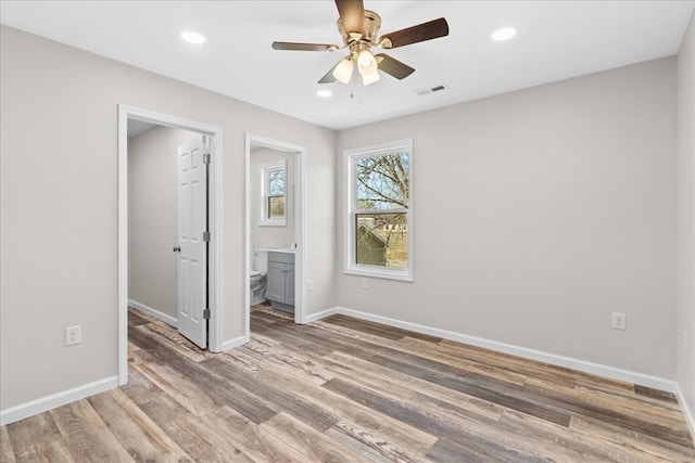 unfurnished bedroom with recessed lighting, visible vents, baseboards, and light wood-style floors