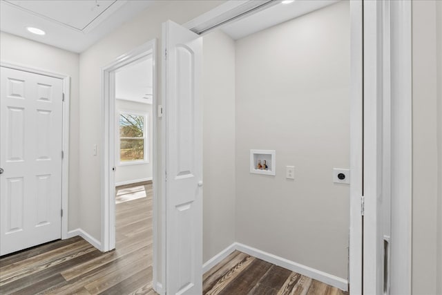 clothes washing area featuring hookup for a washing machine, baseboards, hookup for an electric dryer, laundry area, and dark wood-style flooring