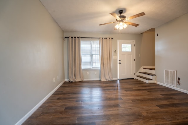 entrance foyer with dark wood-type flooring and ceiling fan