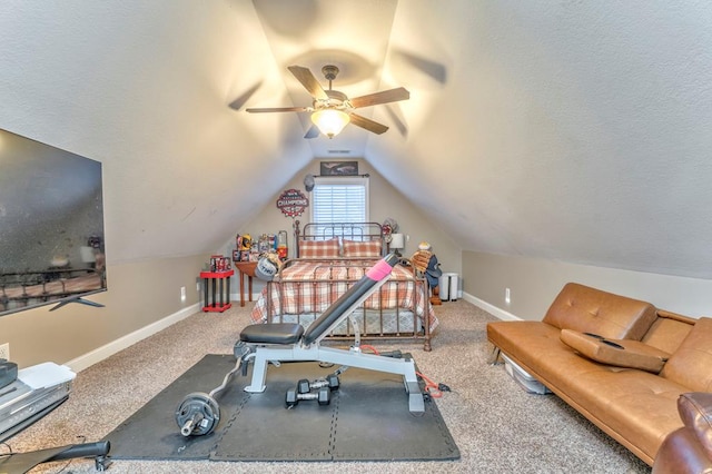workout room featuring baseboards, a ceiling fan, carpet, and lofted ceiling