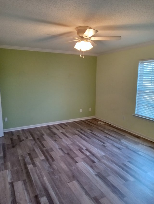 unfurnished room with hardwood / wood-style flooring, ceiling fan, ornamental molding, and a textured ceiling