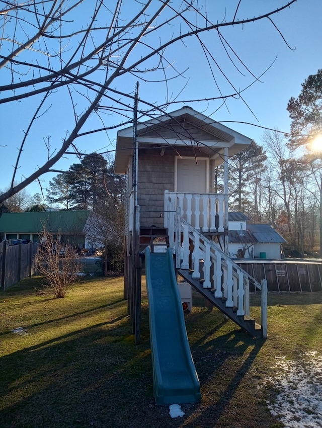 view of jungle gym with a yard