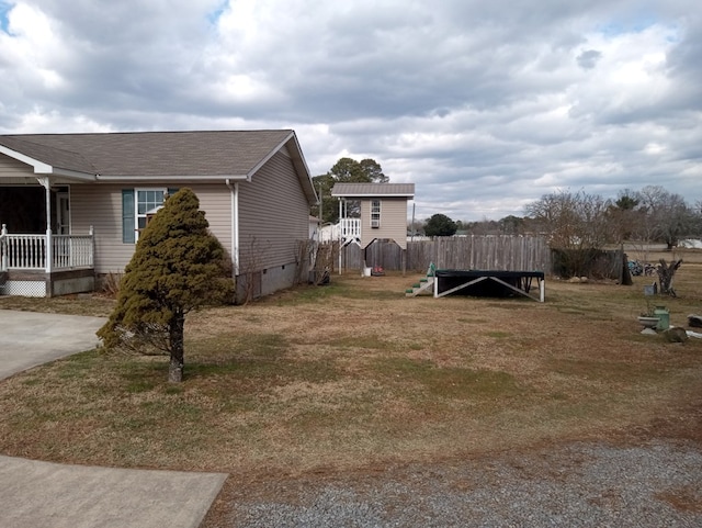 view of property exterior featuring a lawn