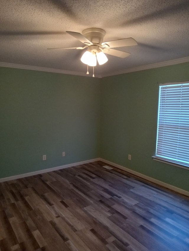 spare room with hardwood / wood-style flooring, ornamental molding, a textured ceiling, and ceiling fan