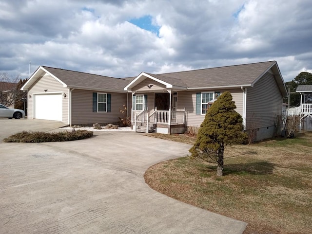 single story home with a garage, a porch, and a front yard