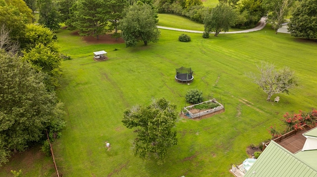 birds eye view of property with a rural view