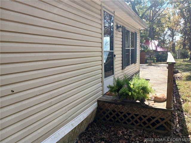 view of home's exterior featuring a deck