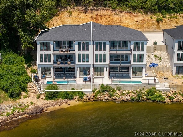 128 Palisades Yacht Club Dr, Lake Ozark, MO 65049 - back of property with a water view
