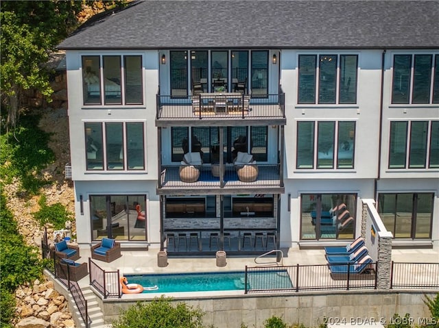 back of house featuring a patio area