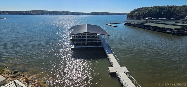 view of dock with a water view