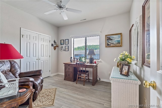 office featuring ceiling fan and light wood-type flooring