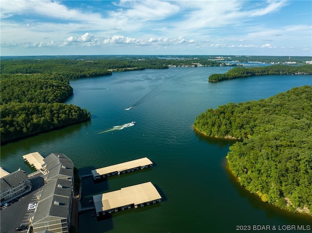 birds eye view of property featuring a water view