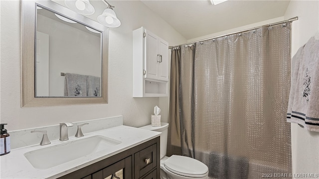 full bathroom with vanity, toilet, and shower / bathtub combination with curtain