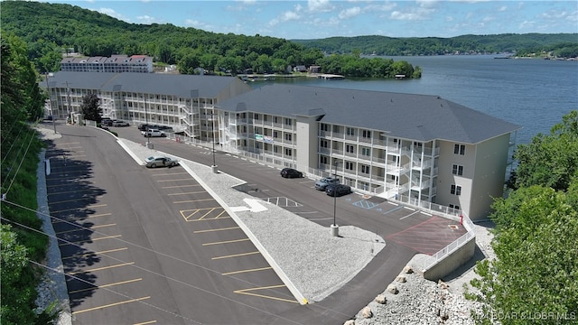 drone / aerial view with a water view