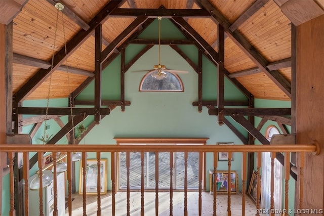 details featuring wood ceiling, ceiling fan, and beamed ceiling