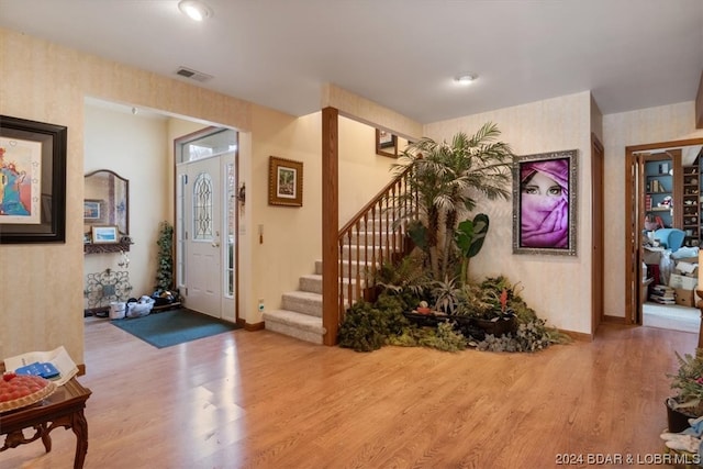 entrance foyer with hardwood / wood-style flooring