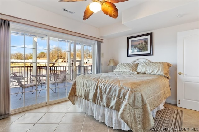 tiled bedroom featuring access to outside and ceiling fan