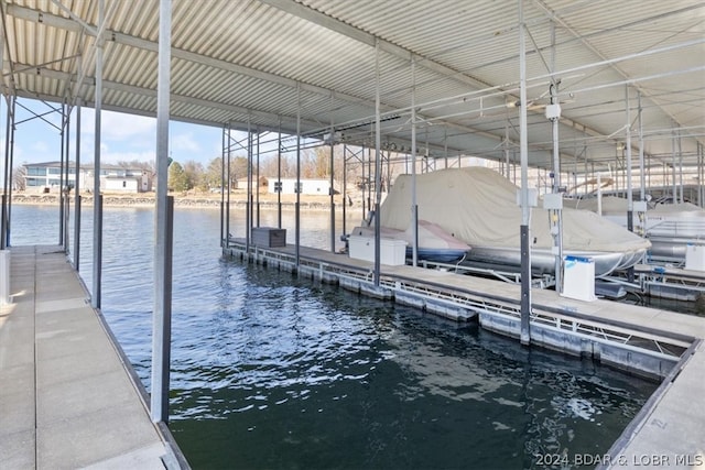 dock area featuring a water view