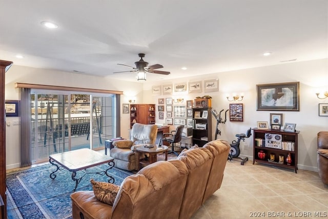 tiled living room with ceiling fan