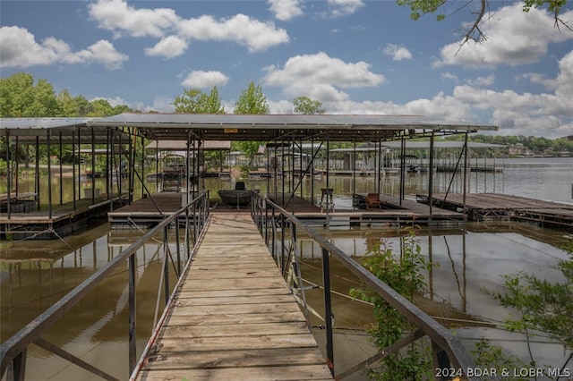 view of dock with a water view