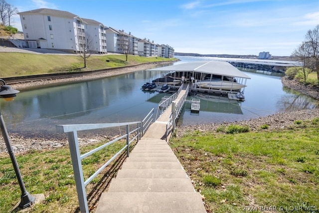 dock area featuring a water view