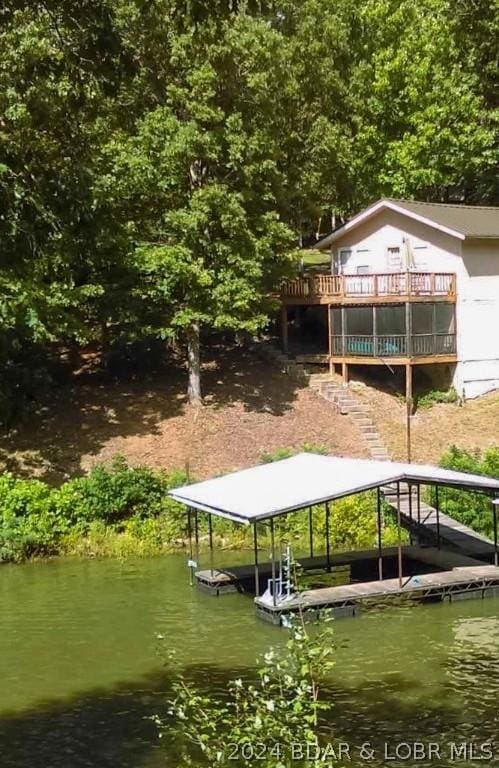 dock area with a water view