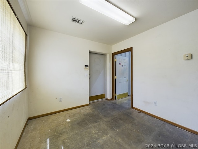 empty room featuring concrete floors