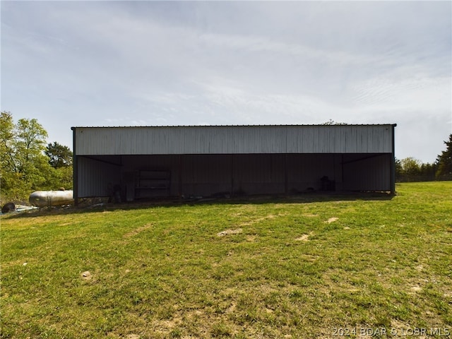 garage with a lawn