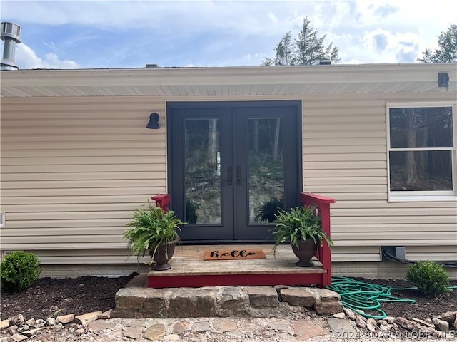 doorway to property featuring french doors