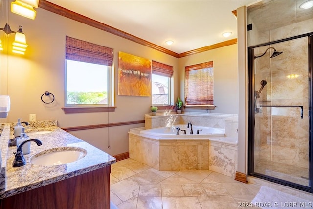 bathroom featuring ornamental molding, shower with separate bathtub, and vanity