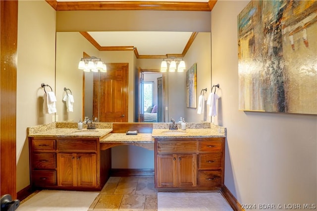 bathroom with vanity and ornamental molding