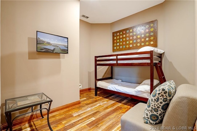 bedroom featuring hardwood / wood-style floors