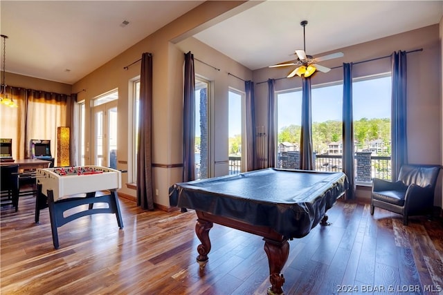 rec room with hardwood / wood-style floors, billiards, and ceiling fan