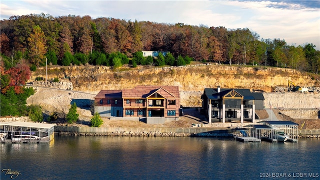 exterior space with a water view