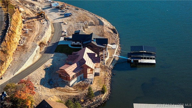 aerial view featuring a water view