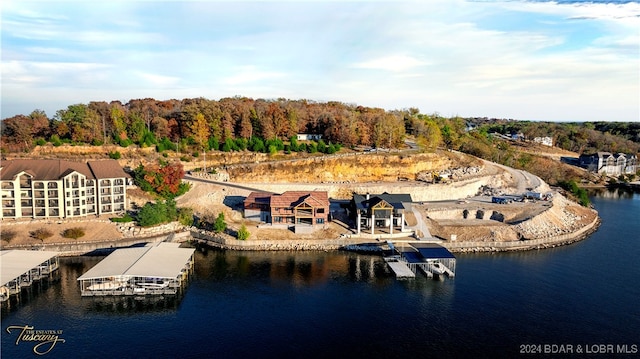 birds eye view of property featuring a water view