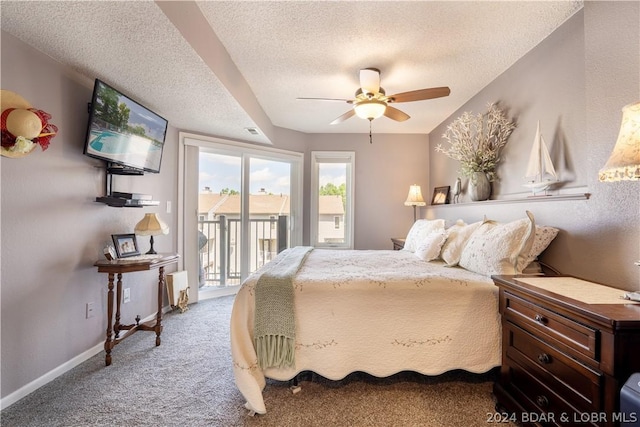 carpeted bedroom featuring a textured ceiling, access to outside, and ceiling fan